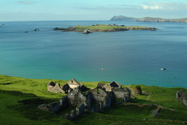 Ruins of Gt Blasket Island with a view of Beginish Island and Sybil head Photo